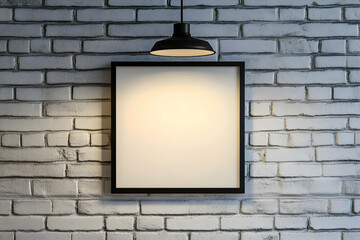 Minimalist frame on white brick wall illuminated by pendant lamp showcasing a blank canvas for artwork or graphic design presentations