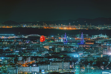 Wall Mural - Cityscape of Osaka bay area at night