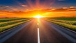 © Jiajia - Road leading to a vibrant sunset over a green field