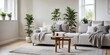 © vattana - Serene Living Room Interior Design with Neutral Tones and Lush Greenery Featuring a Comfortable Sectional Sofa and Stylish Wooden Coffee Table