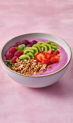 Canvas Print - Berry smoothie bowl with granola and fruit toppings on pink backdrop. Healthy breakfast or snack