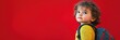 © kashif - Curious child with backpack on bold red background