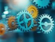 © taweesak - Close Up Of Blue And Yellow Cogwheels Gears Mechanism On Blurred Background