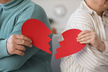 Wall Mural - Mature couple with broken heart at divorce lawyer's office, closeup