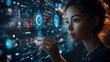 © pete99 - Woman interacts with futuristic holographic display, night scene, technology, possible use for software/tech company