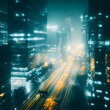 © Fragton - Foggy Cityscape at Night Showcasing Long Exposure Light Trails Amidst Modern Buildings and Urban Glow.