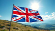 © designbym - United Kingdom flag union jack flying in the morning