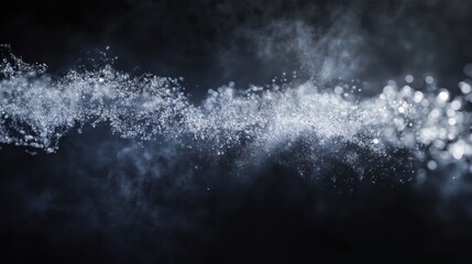 Canvas Print - sparkling water particles on dark background in ethereal smoke