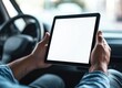 © wpw - Close-up of a man holding a black tablet with a blank white screen, ready for your creative ideas.