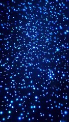 Wall Mural - Dynamic blue light particles flow in a starry night sky virtual background