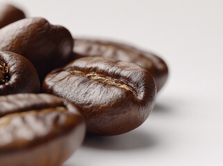 Wall Mural - Close-up of roasted coffee beans on white background.