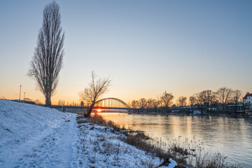 Wall Mural - Warta riverside at sunset in Gorzow Wielkopolski in winter. Poland