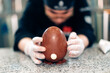 © Carlo Prearo - Pastry chef crafting a chocolate Easter egg