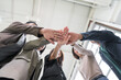 © PhugunStock - Asian business men and women join forces to check hands happily. Brainstorm and talk about analytics, innovation, and collaboration. online business Modern sales techniques and strategic planning