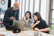 © PhugunStock - Businessman, Asian man and woman The meeting was tense. Brainstorm and talk about analysis, innovation, and collaboration. online business Modern sales techniques and strategic planning