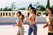 © Xavier Lorenzo - Three young athletic friends jogging together outdoors in summer. Healthy lifestyle and sport concept