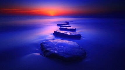 Poster - Sunrise path of stones on tranquil beach