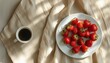 ©  VladaToday - Flat lay composition with fresh strawberries and coffee on neutral fabric with copy space for design