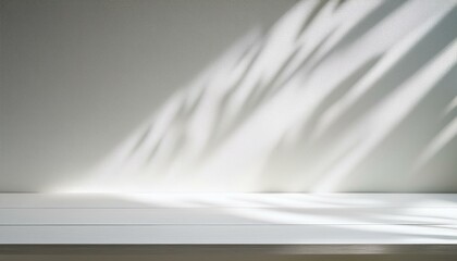 Wall Mural - white table background white wall with shadow from light rays