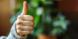 © crazyass - Happy customer giving thumbs up for a product in a cozy indoor setting lifestyle photography