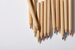 © Tetra Images - Colorful pencils on white background