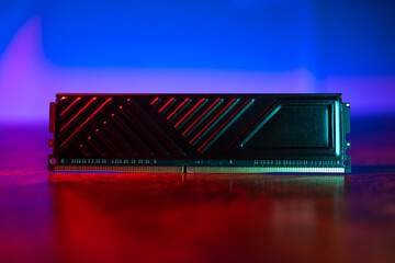 Computer RAM on table neon background