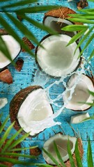 Poster - Super Slow Motion Shot of Falling Coconut on Wooden Background, top shot, 1000 fps.