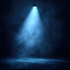dramatic spotlight illuminating empty stage in dark room with misty atmosphere and blue hue