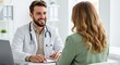 © Lahiru - smiling male doctor in white coat, Consulting with female patient, during medical check-up at clinic,health care,medical student