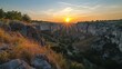 © Tuachan - Breathtaking Sunset Over Rocky Canyon Landscape in Golden Hour