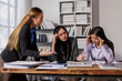 © David - Stressed annoyed office employee manager having headache migraine at business meeting with colleagues about business problem they have to solve. Stress at work or migraine concept.