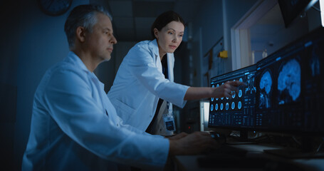 Aufkleber - In Control Room Doctor and Radiologist Discuss Diagnosis while Watching Procedure and Monitors Showing Brain Scans Results. Patient Undergoes MRI or CT Scan Process in High-Tech Medical Facility