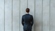 © Nattapol - Business leader in modern office with obsidian wall