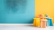 © Alexey - Colorful kids room interior with modern stools and art supplies on table. Two tone turquoise and yellow wall background with white floor. Contemporary minimal design for classroom or playroom