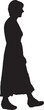 © Curto - vector; silhouette; side view of a woman walking dressed long dress