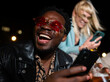 © liderina - Group of Multi-Ethnicity people having fun outdoor in the night. Celebrate.