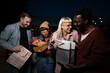 © liderina - Group of Multi-Ethnicity people having fun outdoor in the night. Celebrate.