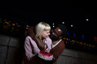 © liderina - Group of Multi-Ethnicity people having fun outdoor in the night. Celebrate.
