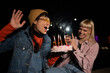 © liderina - Group of Multi-Ethnicity people having fun outdoor in the night. Celebrate.