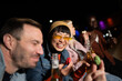 © liderina - Group of Multi-Ethnicity people having fun outdoor in the night. Celebrate.