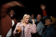© liderina - Group of Multi-Ethnicity people having fun outdoor in the night. Celebrate.