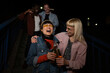 © liderina - Group of Multi-Ethnicity people having fun outdoor in the night. Celebrate.