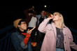 © liderina - Group of Multi-Ethnicity people having fun outdoor in the night. Celebrate.