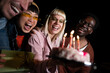 © liderina - Group of Multi-Ethnicity people having fun outdoor in the night. Celebrate.