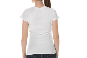 Wall Mural - Woman wearing cotton t-shirt on white background, closeup