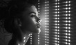© taraskobryn - portrait of a beautiful woman near the window black and white