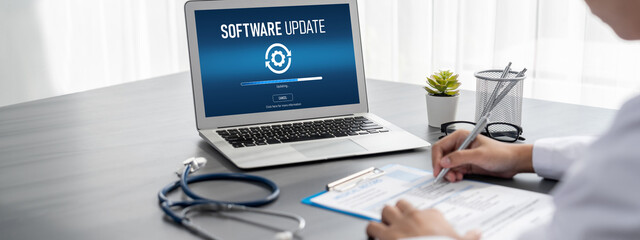 Wall Mural - software update on computer for brisk version of device software upgrade