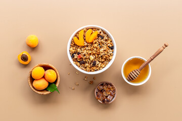 Wall Mural - Top view of breakfast with oatmeal granola and ingredients. Healthy morning routine