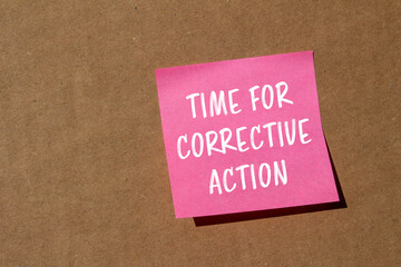 Leinwandbilder - Time for corrective action message written on pink paper on brown background. Conceptual time for corrective action symbol. Copy space.