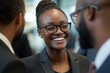© Serhii - Inclusive Business Meeting: Diverse Professionals Engaging in Discussion in a Modern Office Setting